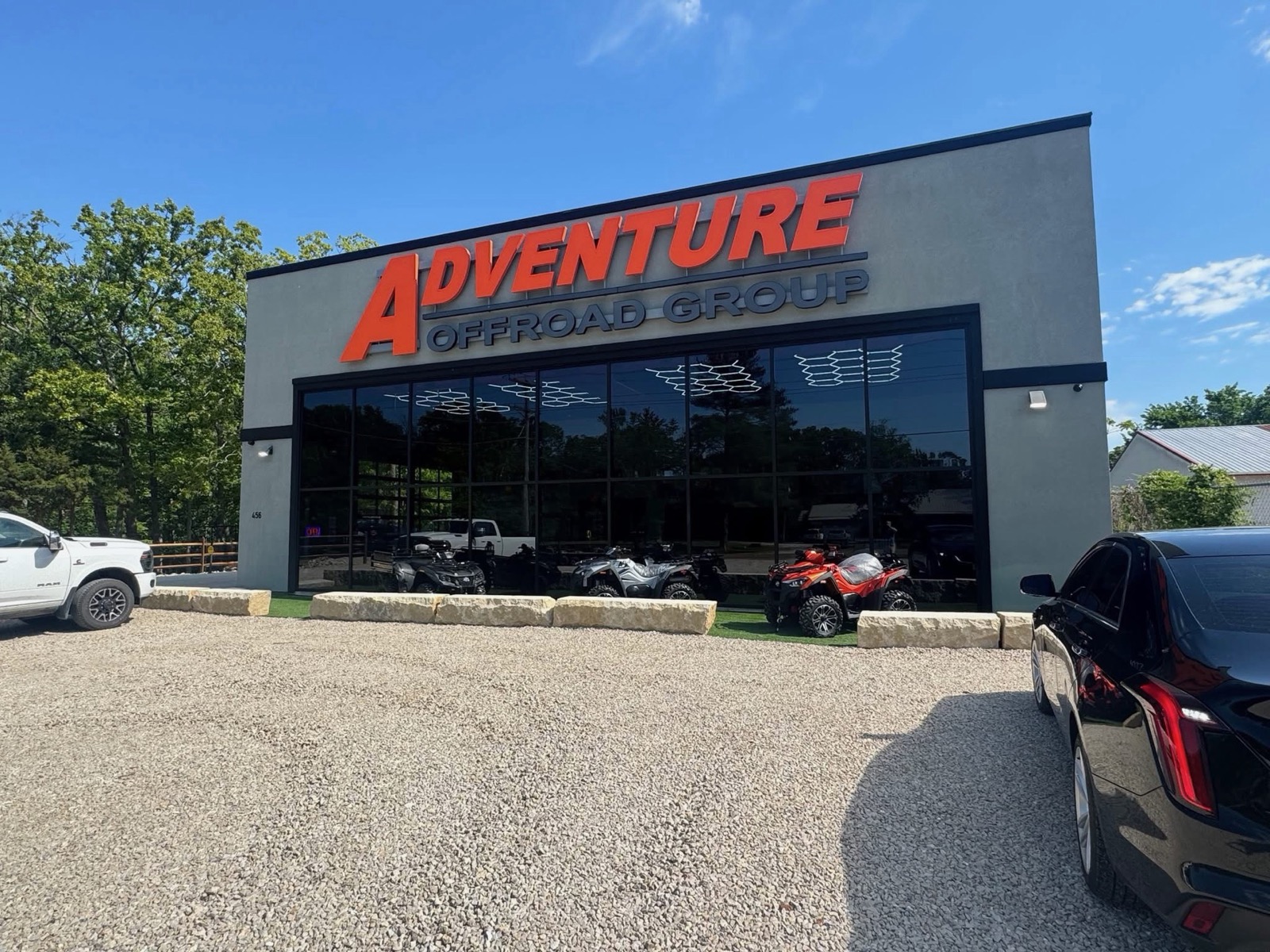 Completed retail building with a full-width glass storefront in the Lake of the Ozarks area, built by Ireland Construction